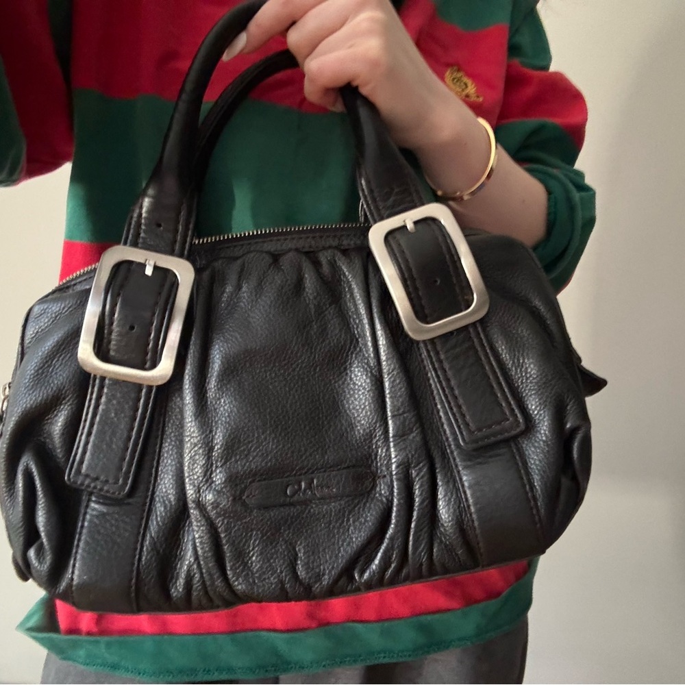 Cole haan leather bag with silver buckles